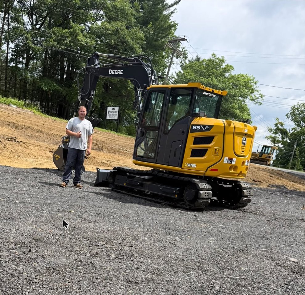 Wykowski Mechanical on a job site with a John Deere excavator